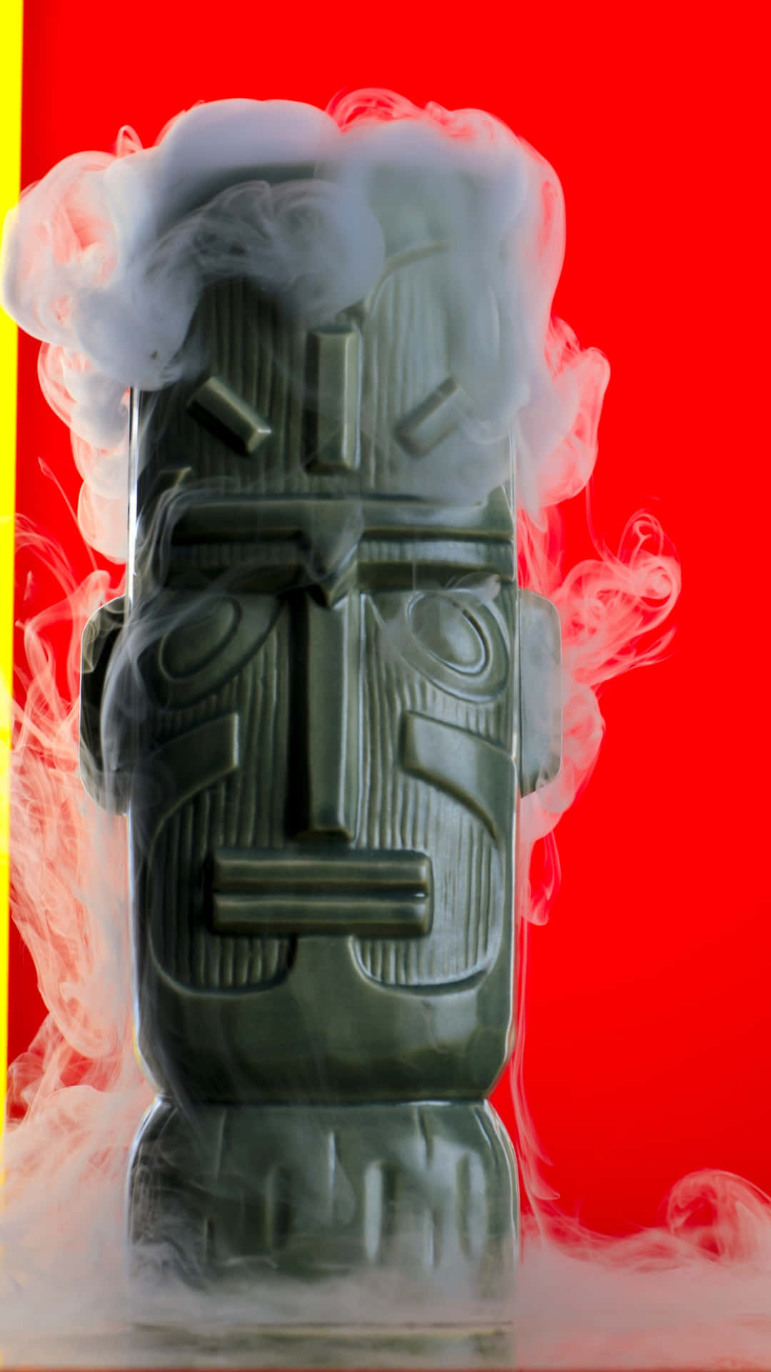 Mystical Smoking Tiki Statue Wallpaper