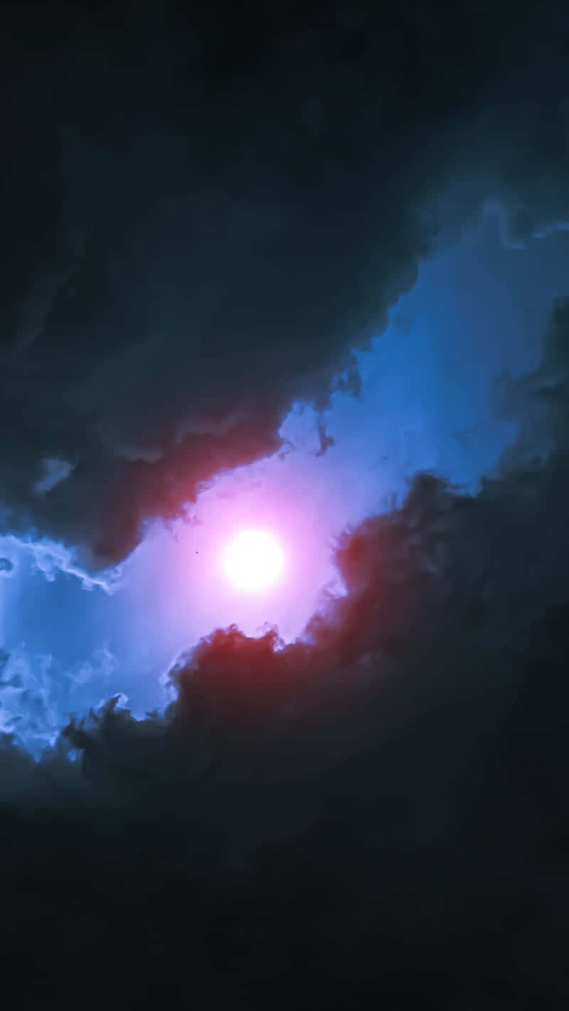 Mystical Sun Through Clouds Wallpaper