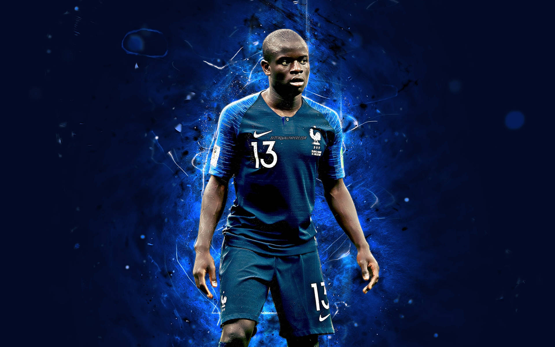 N'Golo Kante Standing Against Blue Abstract Wallpaper