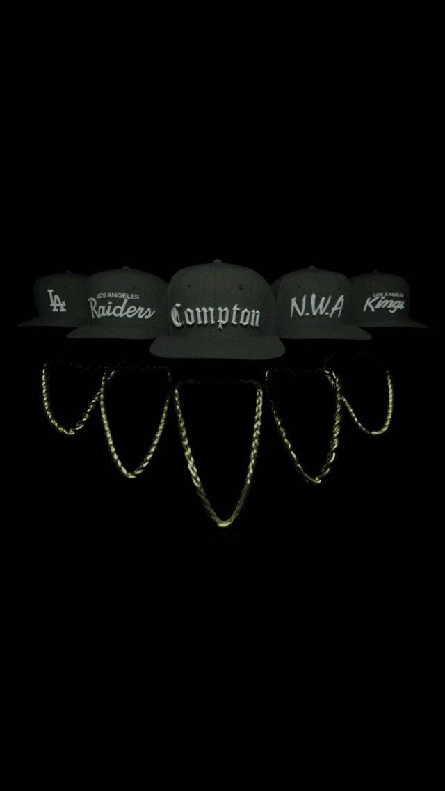 N.W.A. Group Merch Hats And Blings Wallpaper