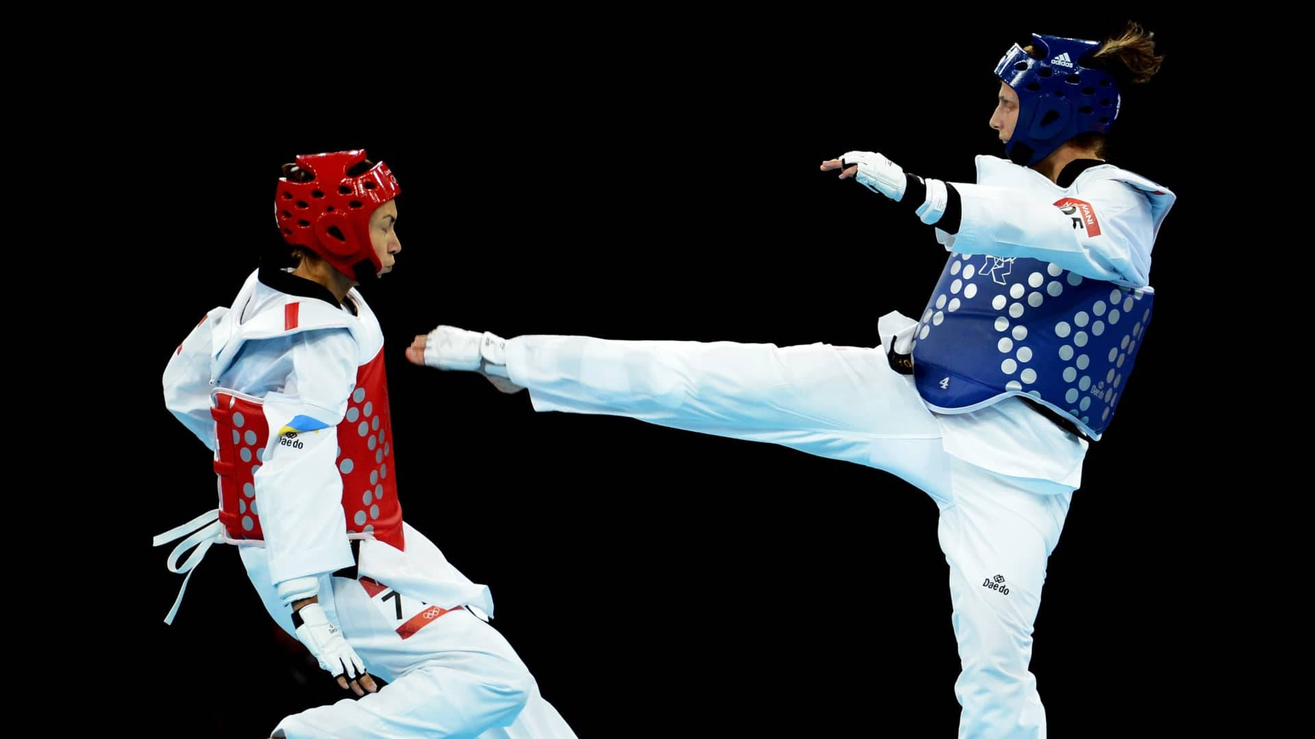 Nadindawani Und Maryna Konieva Taekwondo London Olympisch Wallpaper