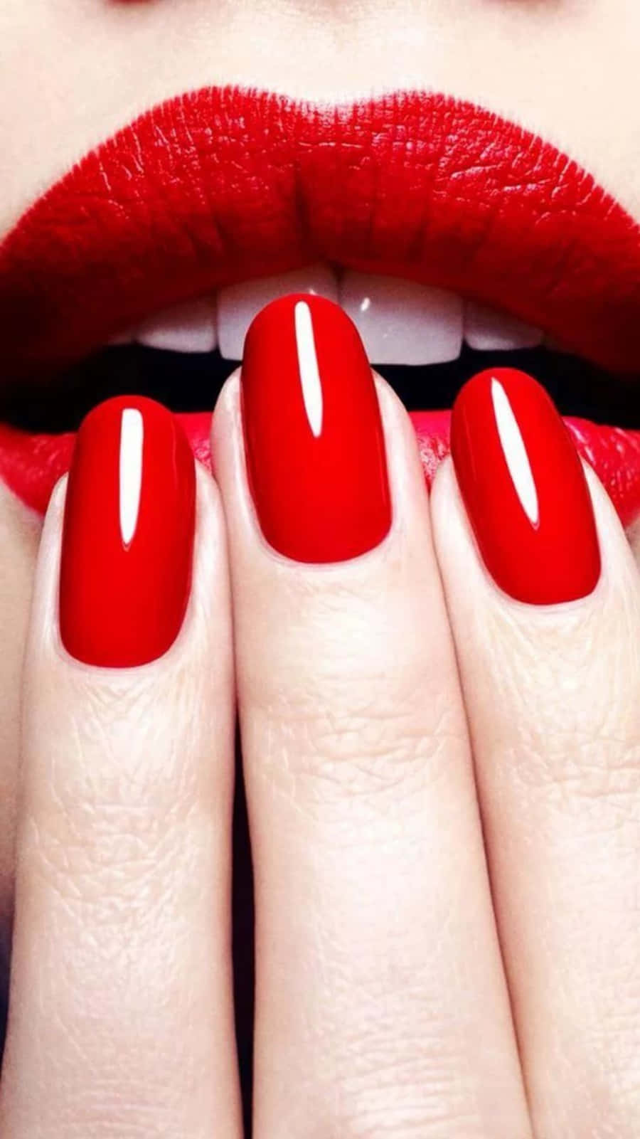 Red Nail Art On Red Lips Picture