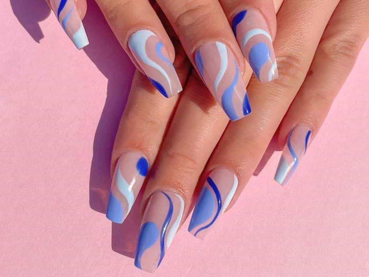 Blue Design Nails with Pink Flowers · Creative Fabrica