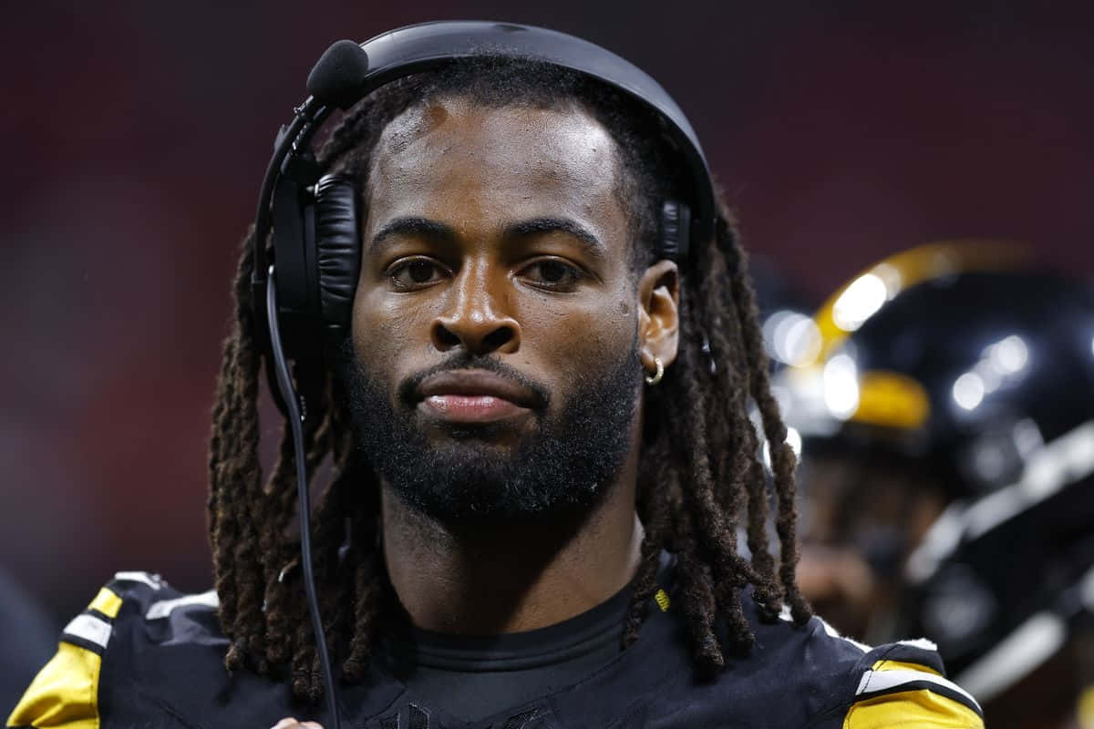 Najee Harris Hoofdtelefoon Football Wedstrijd Achtergrond