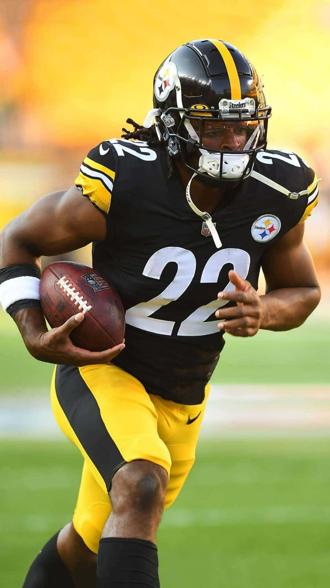 Najee Harris Running Back Steelers Action Shot Wallpaper