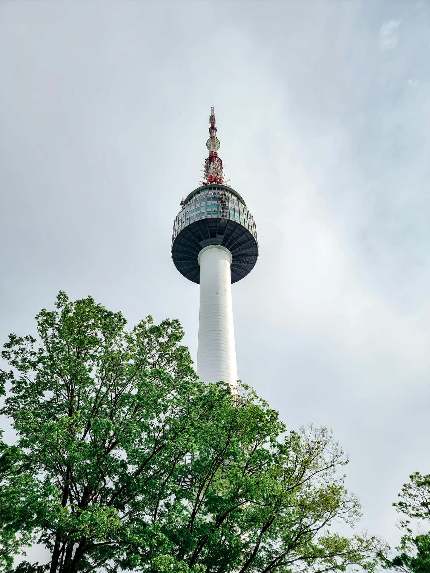 Download Namsan Seoul Tower Against Sky Wallpaper | Wallpapers.com