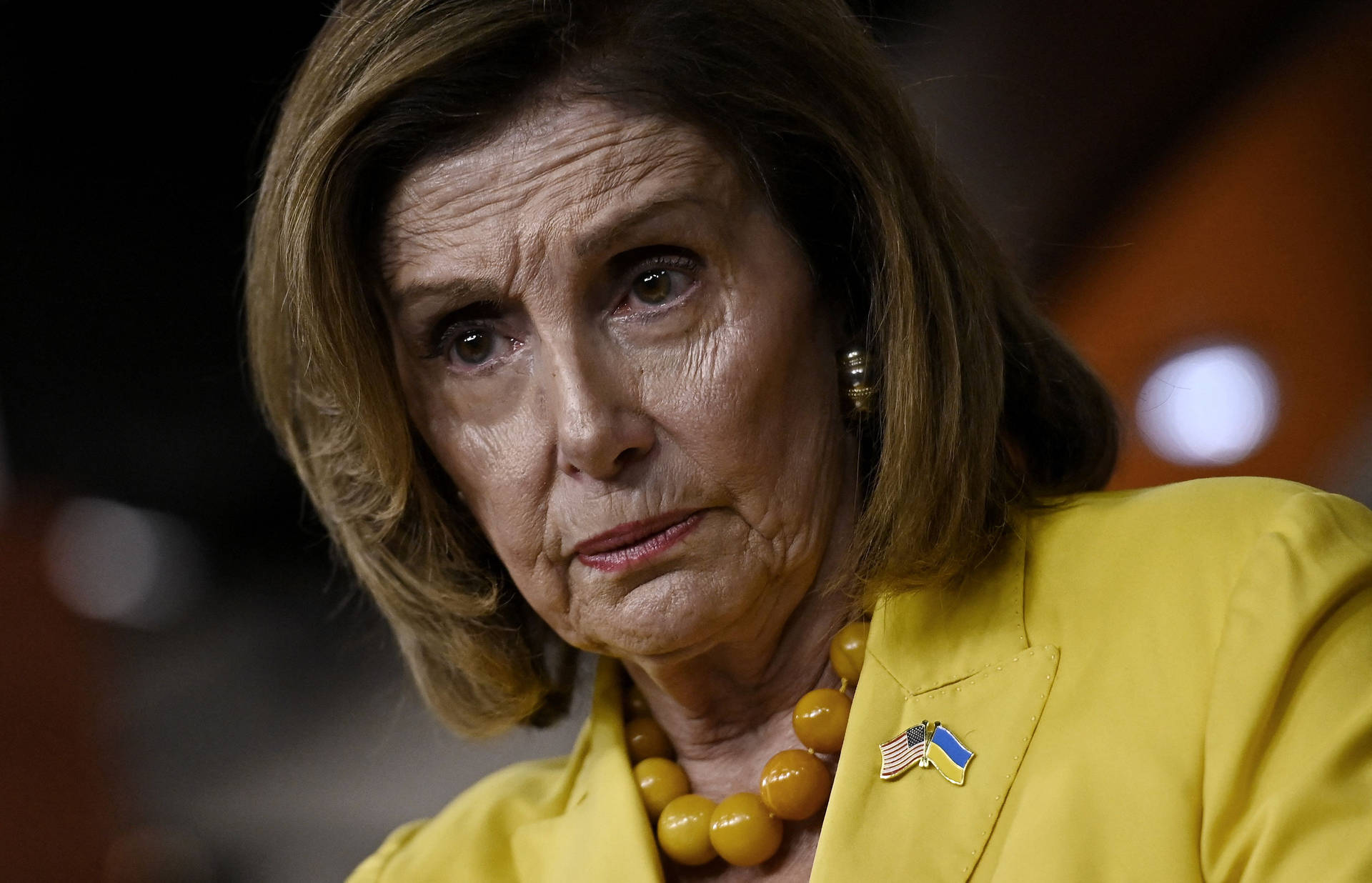 House Speaker Nancy Pelosi Dons Stylish Yellow Outfit Wallpaper