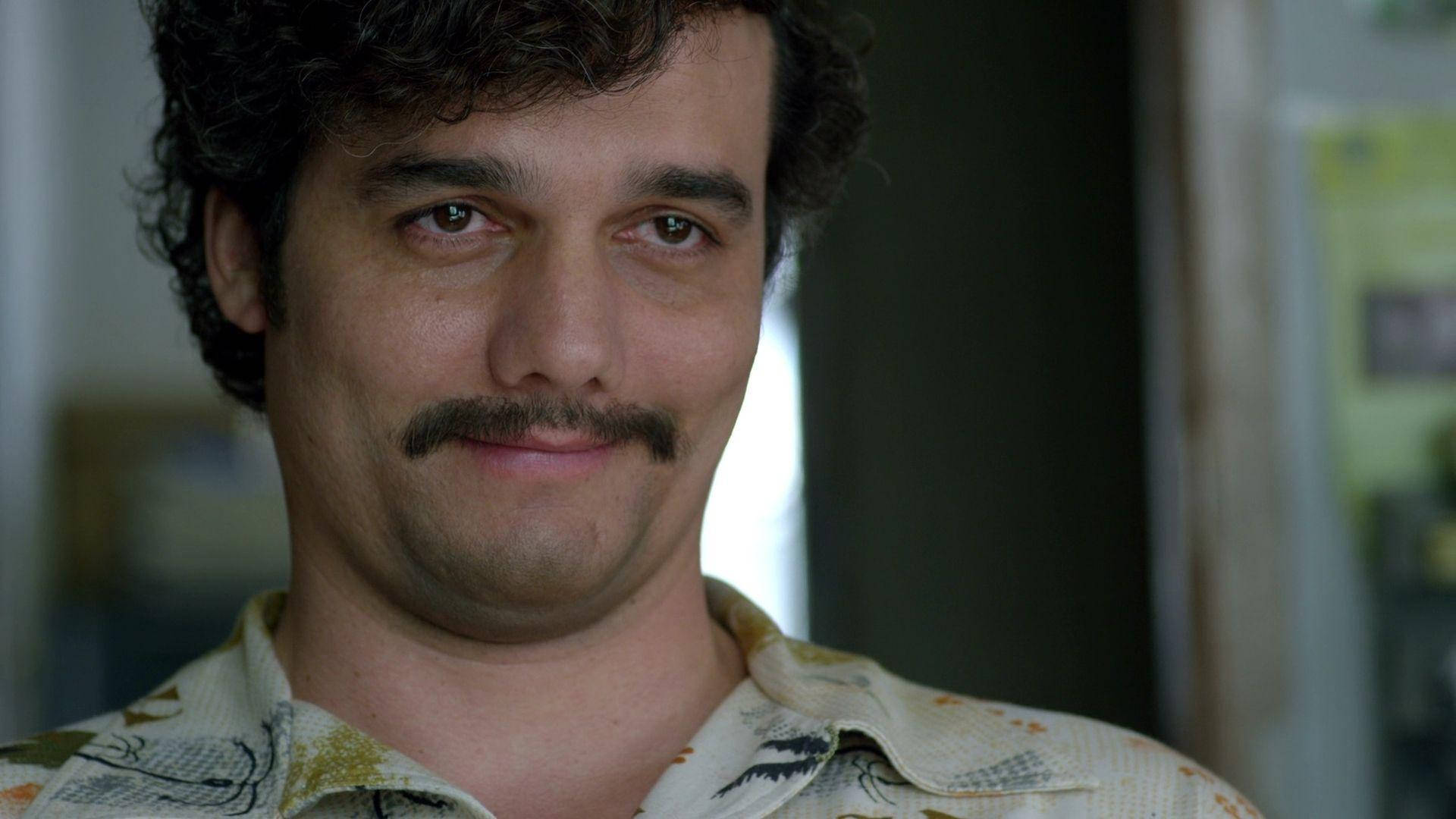 Intense gaze of Pablo Escobar, the infamous Narcos Kingpin Wallpaper