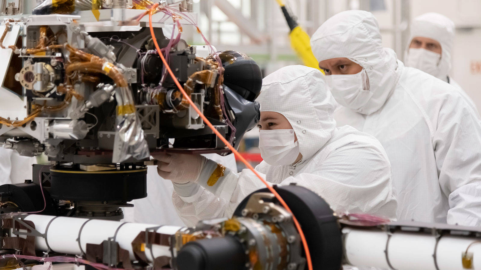 Nasa Engineering Technician Developing Mars 2020 Perseverance Rover Wallpaper