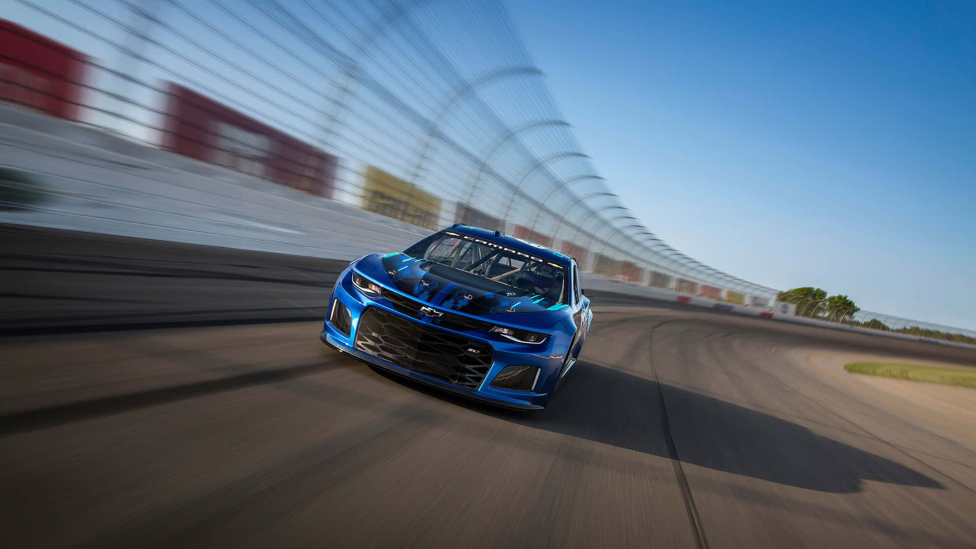 A Thrilling Display of Speed: NASCAR Racing Wallpaper
