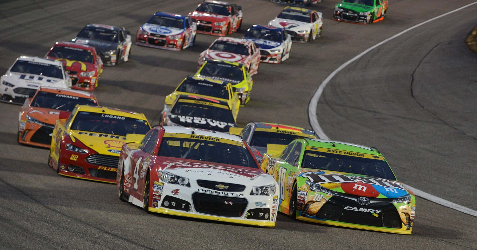 Nascar Drivers Racing On A Track