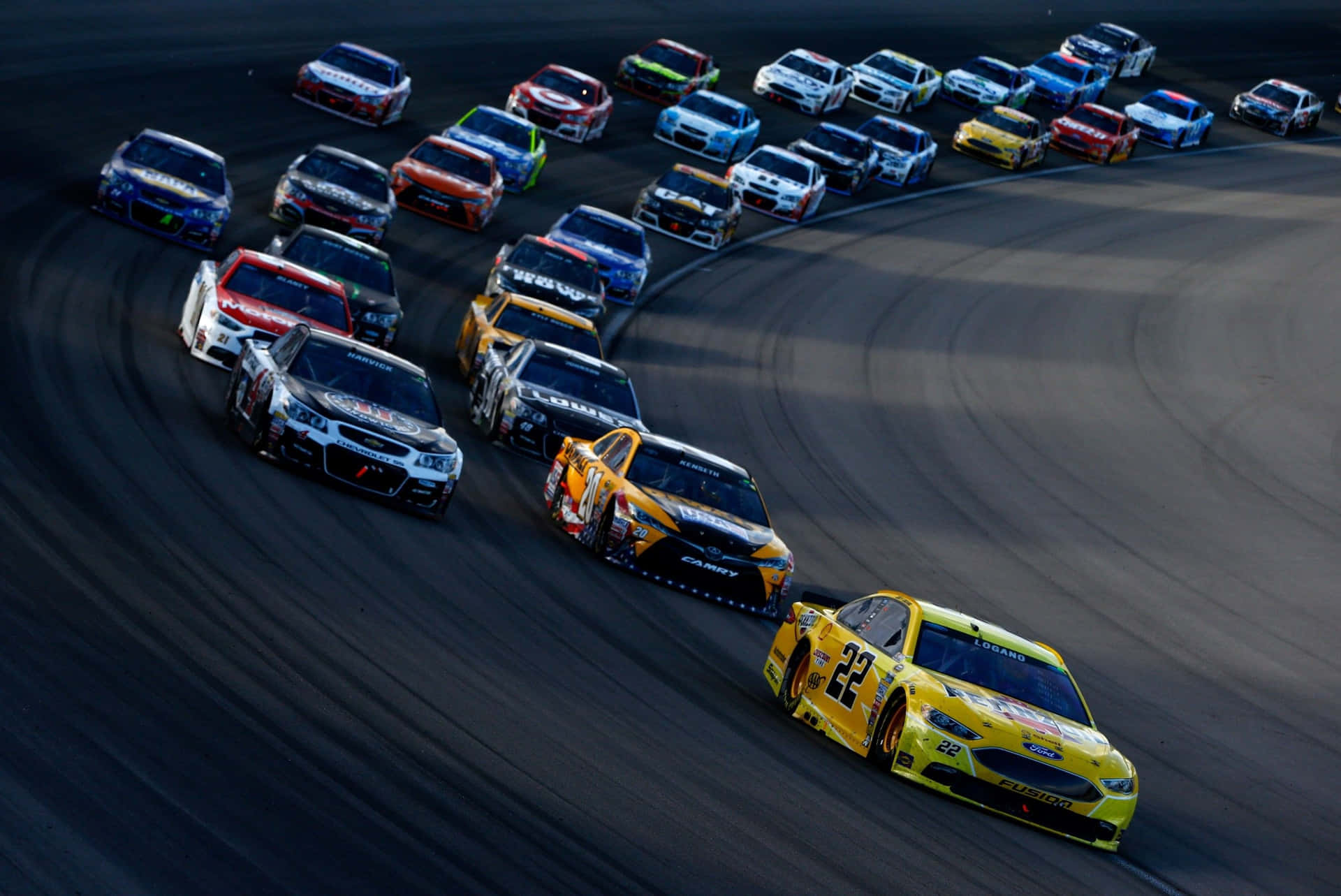 High-Speed NASCAR Racing Action Wallpaper