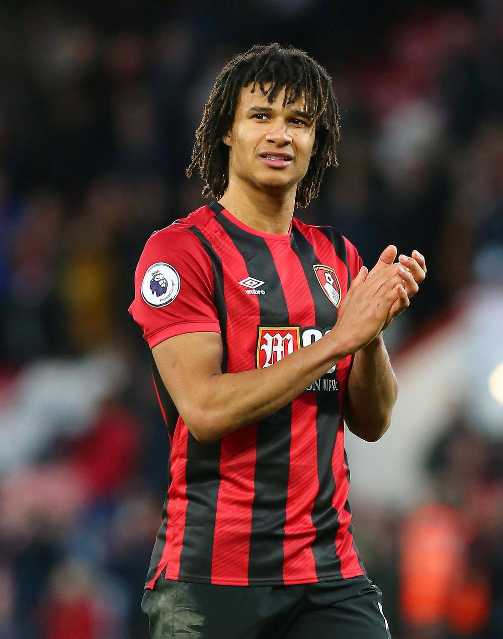 Nathan Ake With His Arms Together Wallpaper
