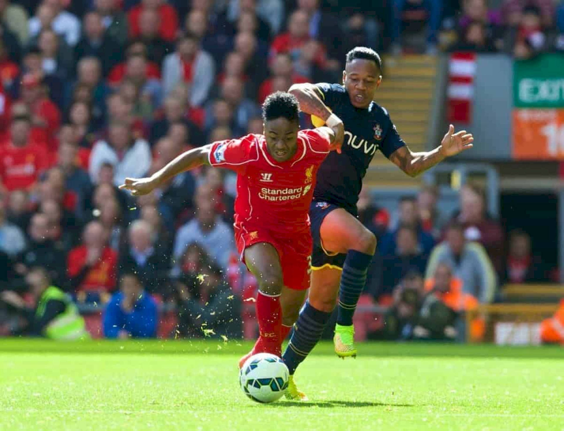 Nathaniel Clyne In Front Of Opponent Wallpaper