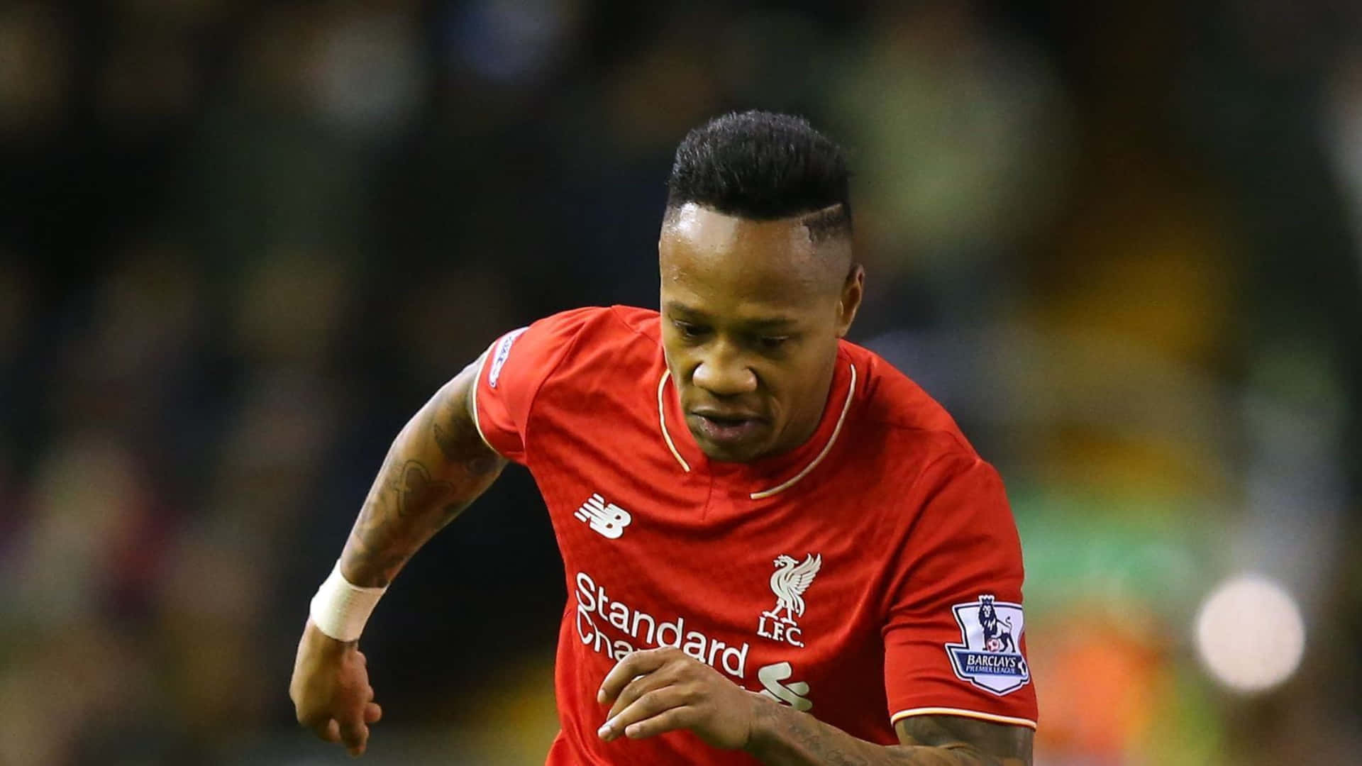 Nathaniel Clyne Looking Down While Running Wallpaper