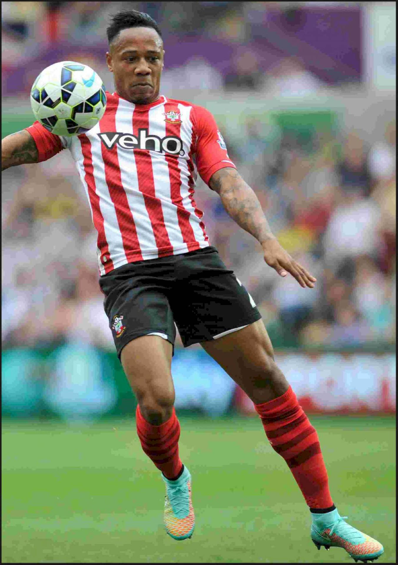 Premier League Star Nathaniel Clyne in Action Wallpaper