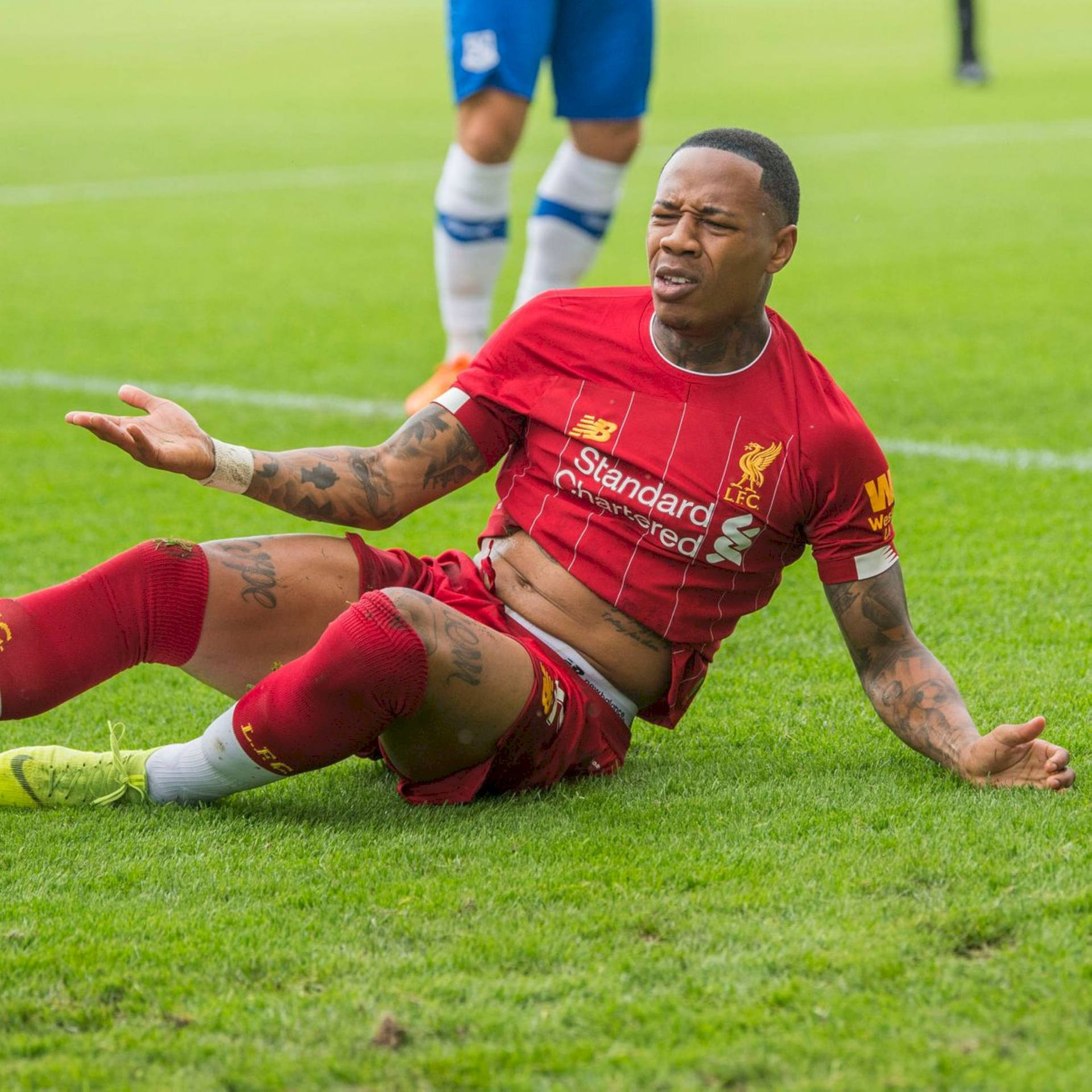 Nathaniel Clyne Sitting On The Field Wallpaper