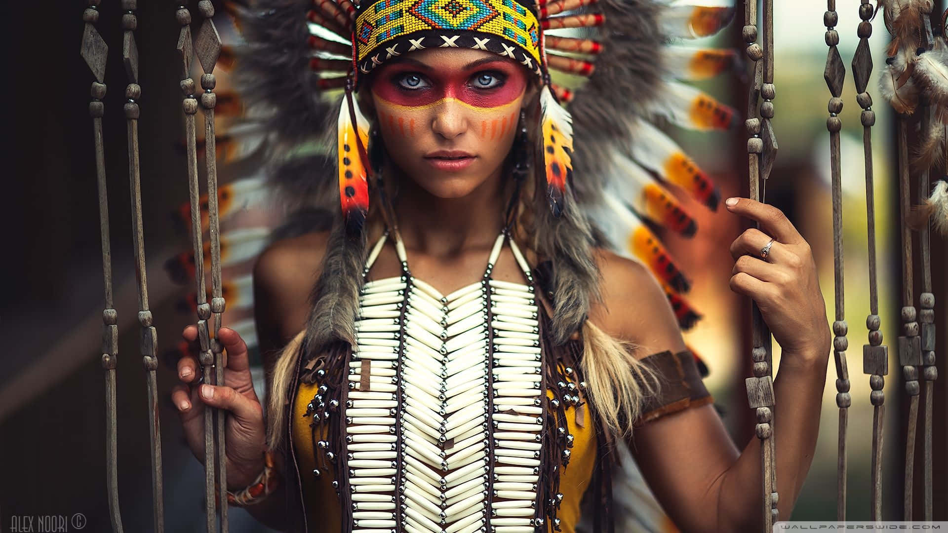 A Native American Indian Looking Out Over a Beautiful Landscape Wallpaper