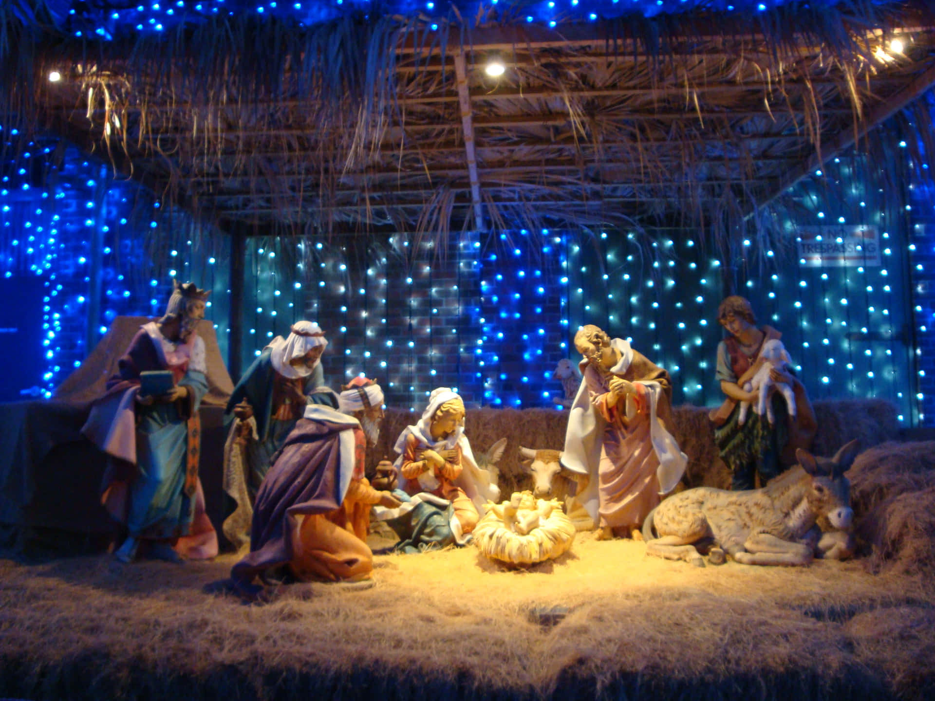 A peaceful nativity scene of the baby Jesus, Mary, and Joseph.