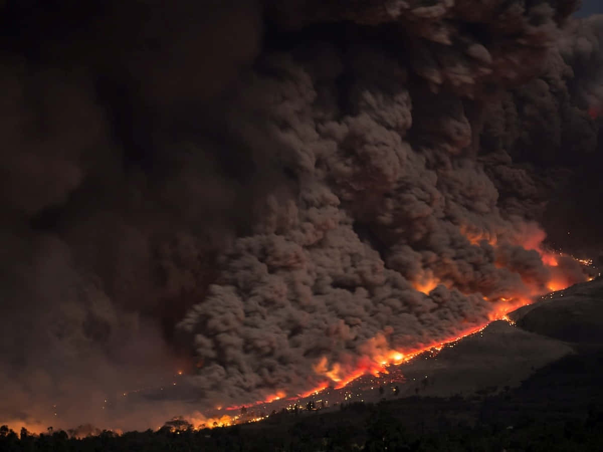 A Large Fire Burns In The Mountains