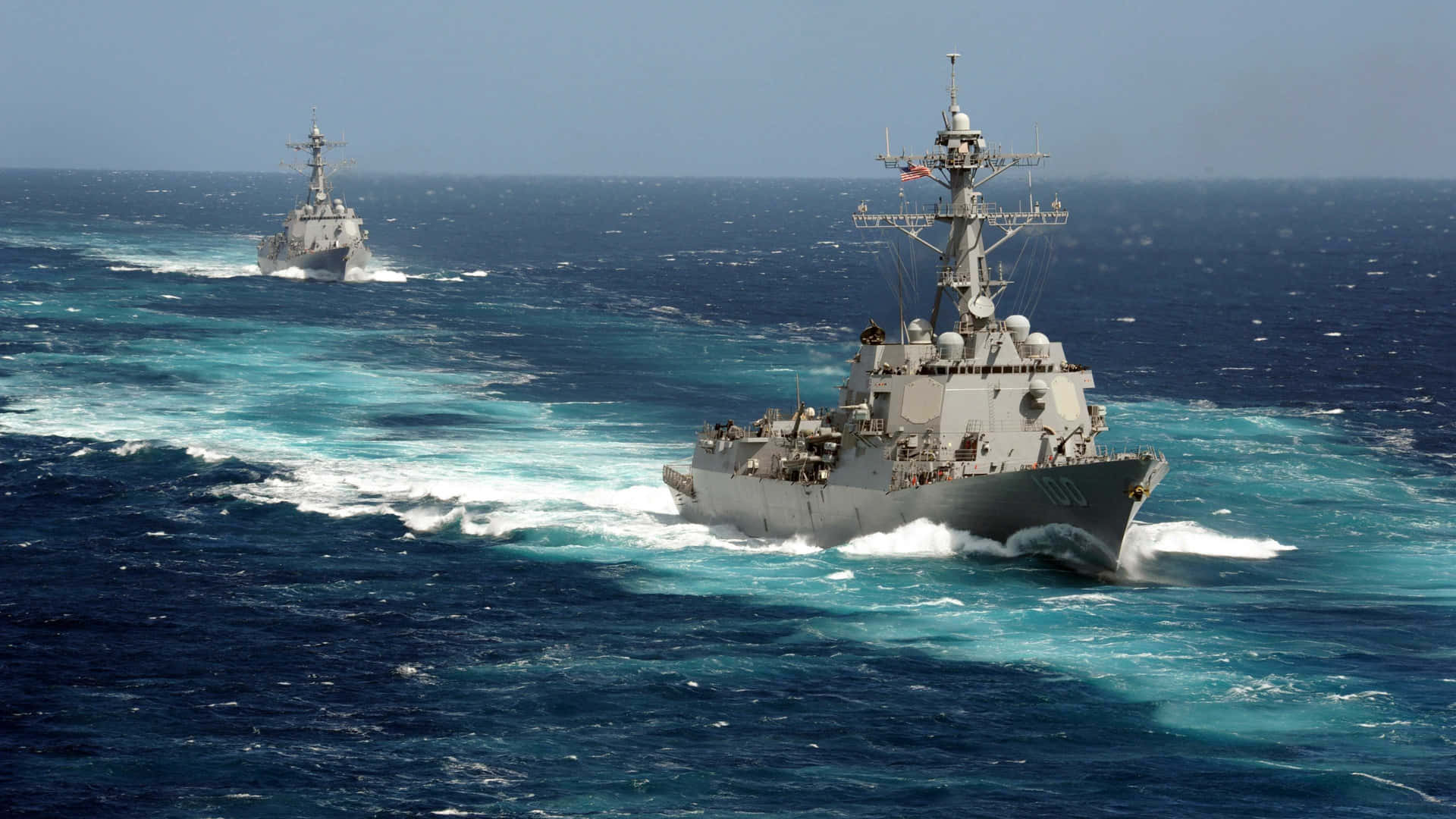 Majestic Navy fleet sailing through the vast ocean