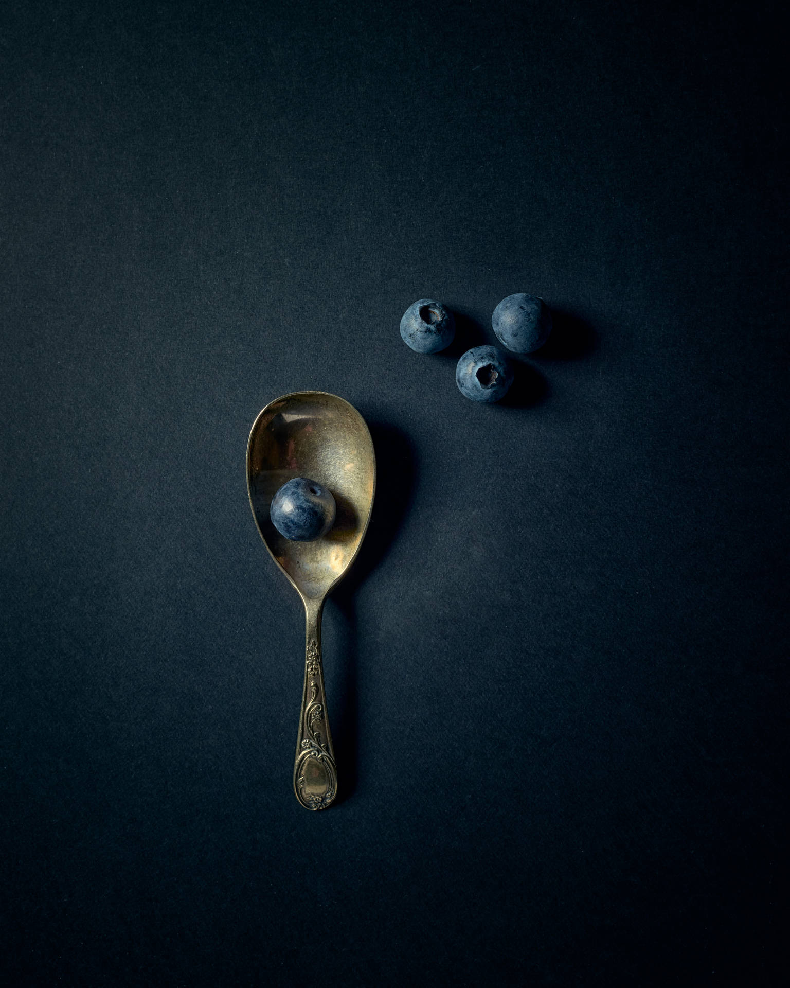Navy Blue Berries And Spoon Background
