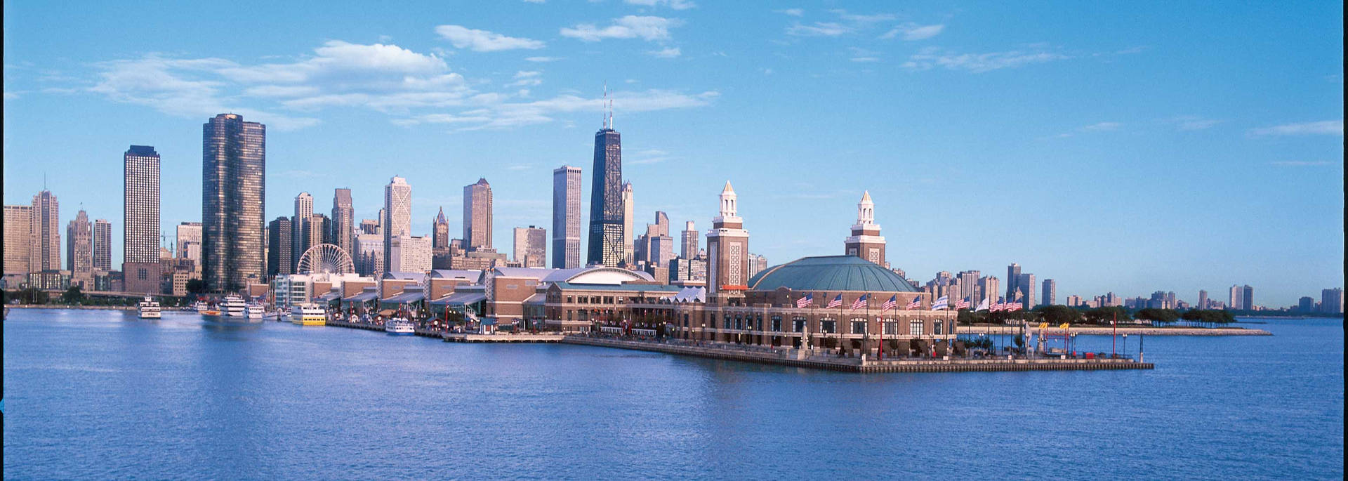 Majestic View of Navy Pier Headhouse against Chicago Skyline Wallpaper