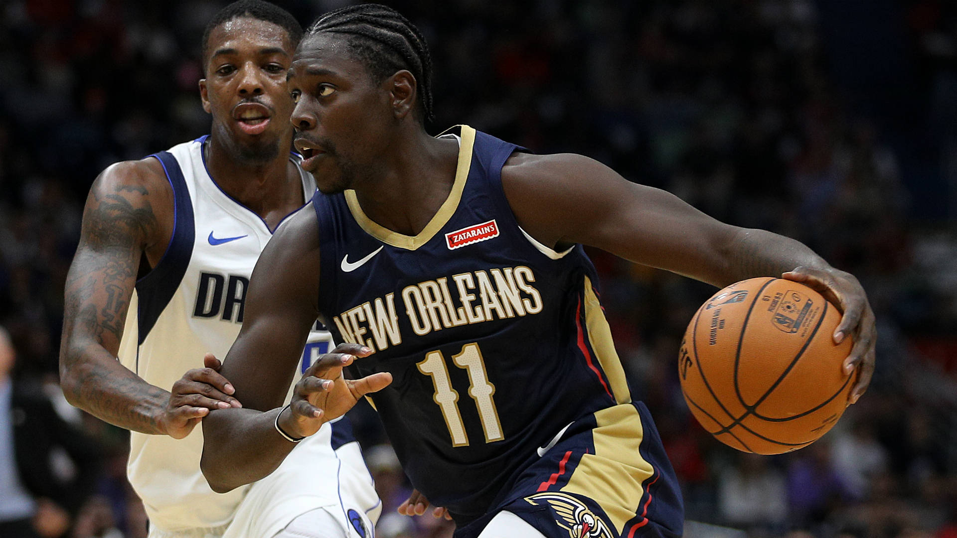 Iconic NBA Player, Jrue Holiday in action Wallpaper