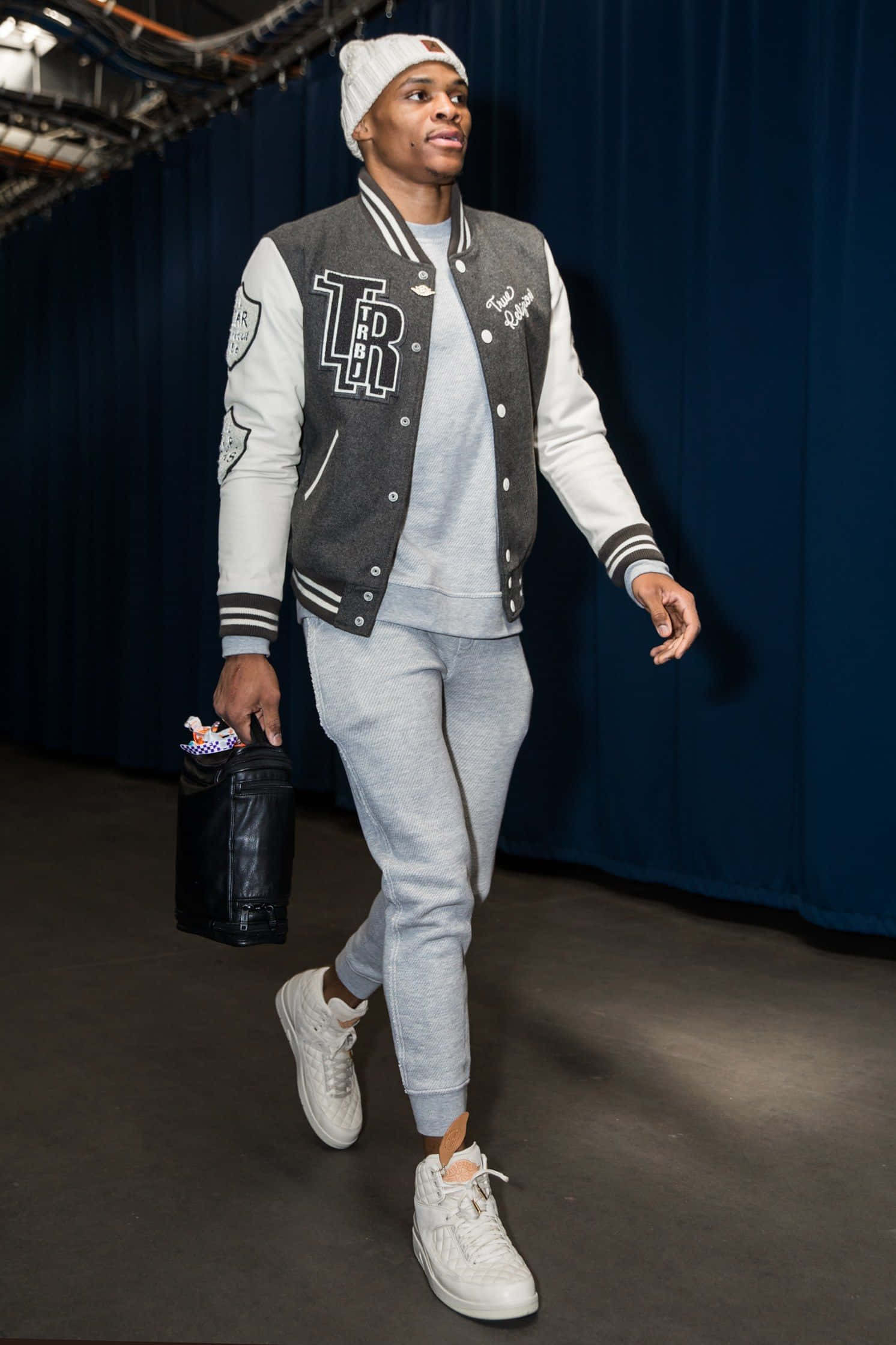 Nba Star Showcasing His Unique Fashion Style Pre-game. Wallpaper