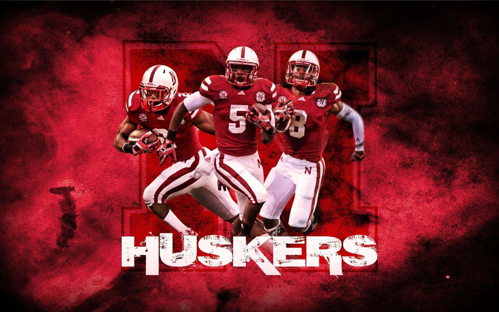 A Red Background With The Words Huskers Wallpaper