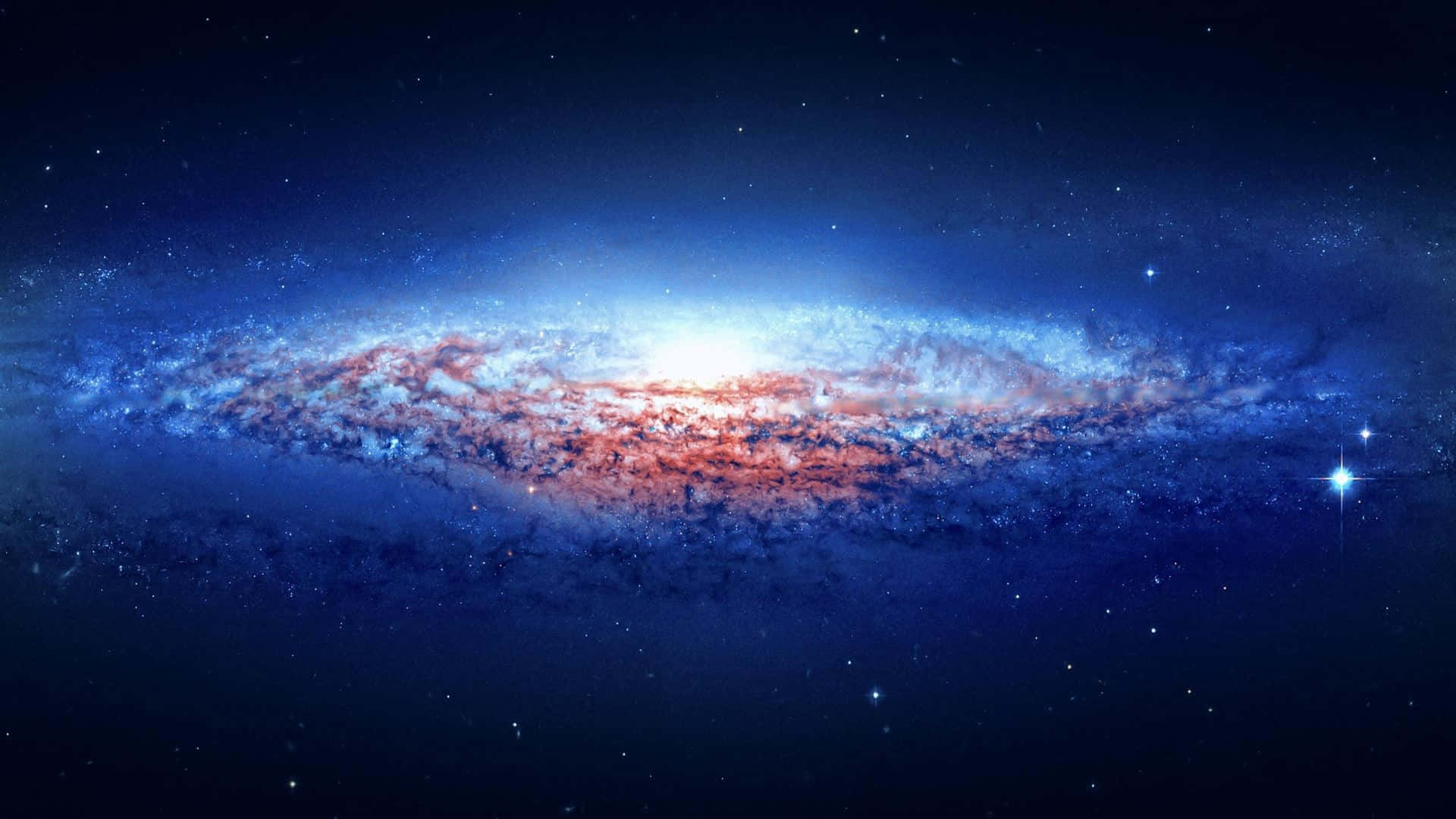 the galaxy in space with stars and blue
