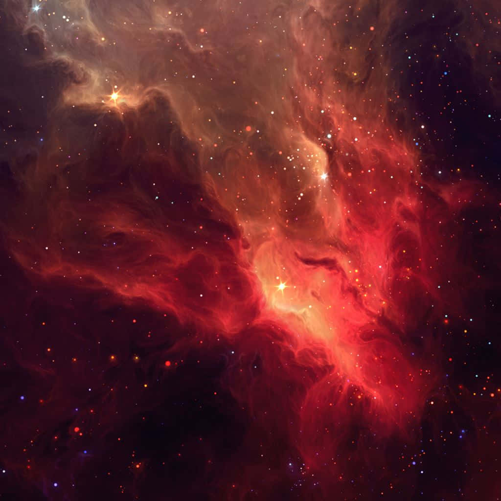 Intrincadosremolinos De Polvo Y Gas Que Forman Estrellas Crean Una Pintoresca Nebulosa En El Espacio.