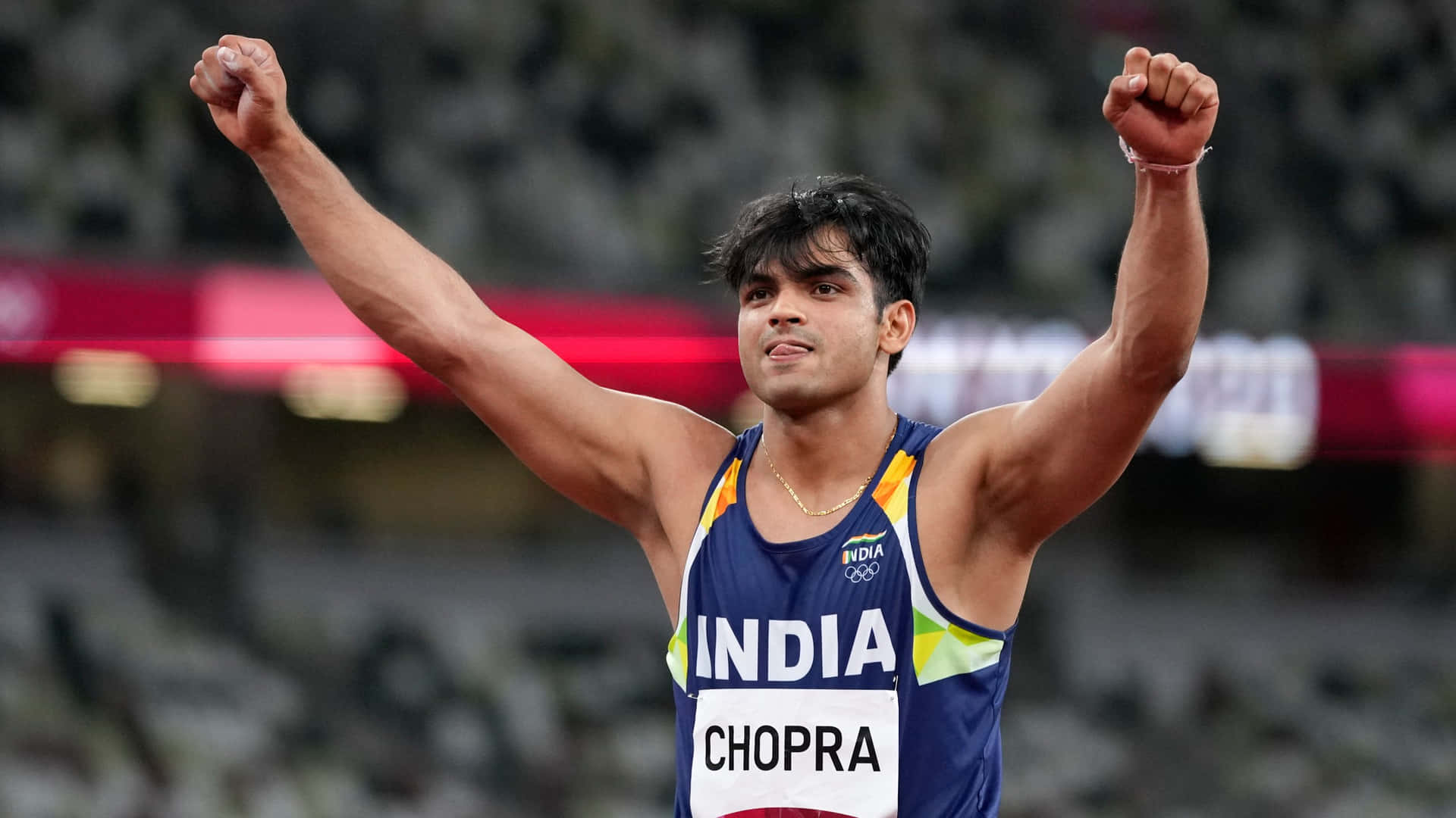 Indian javelin thrower Neeraj Chopra celebrates after winning a gold medal.