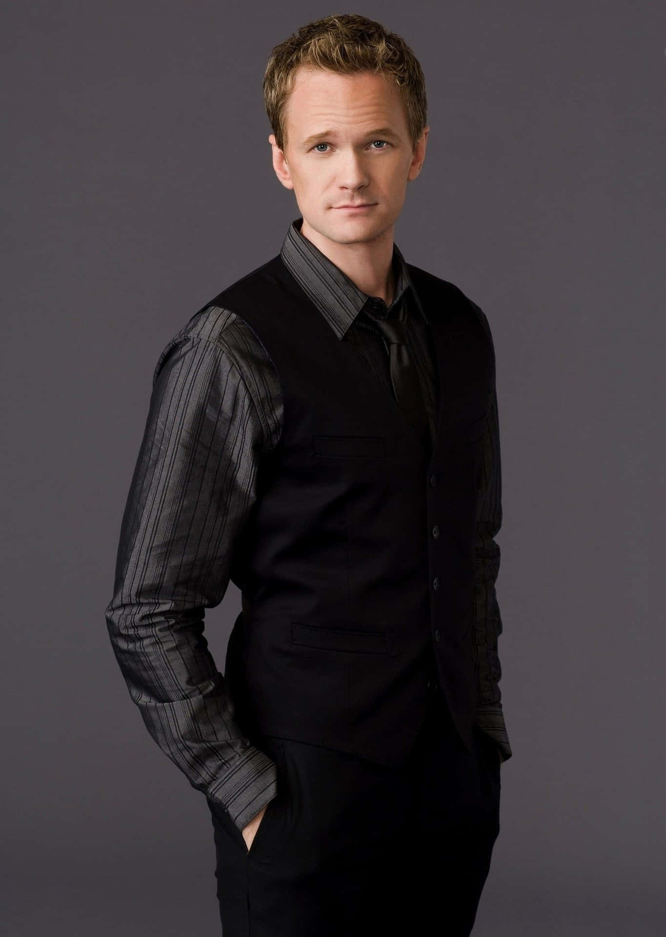 Neil Patrick Harris Posing with a winsome smile Wallpaper