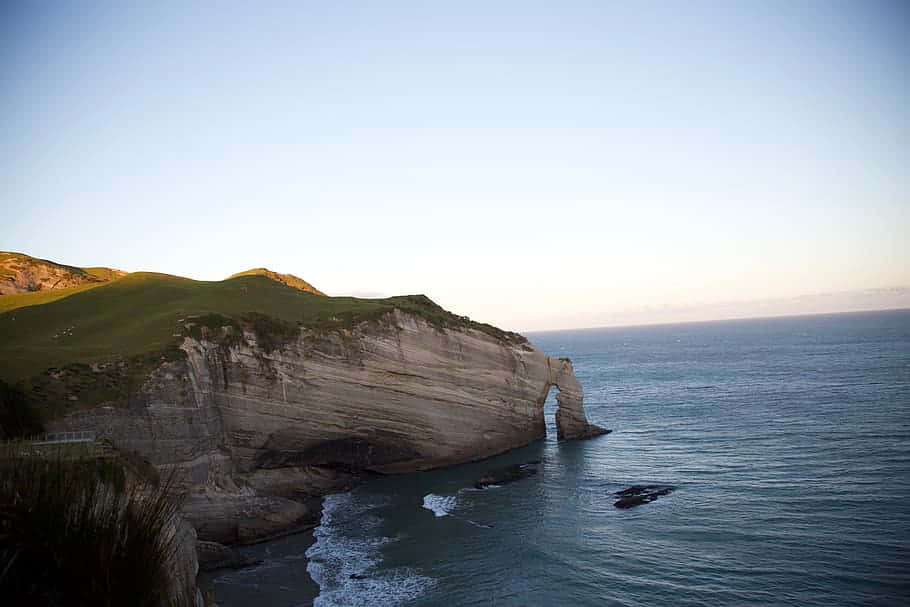 Nelson_ Coastal_ Cliffs_at_ Sunset Wallpaper