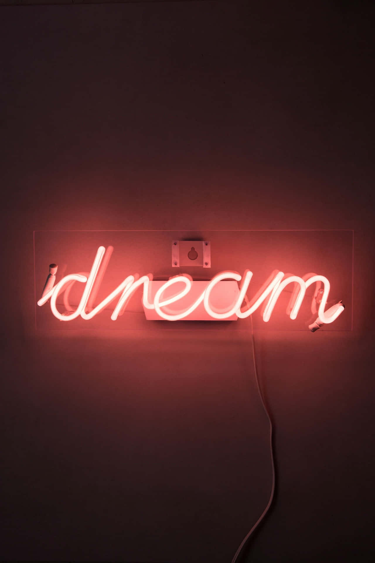 A Neon Sign With The Word Dream On It