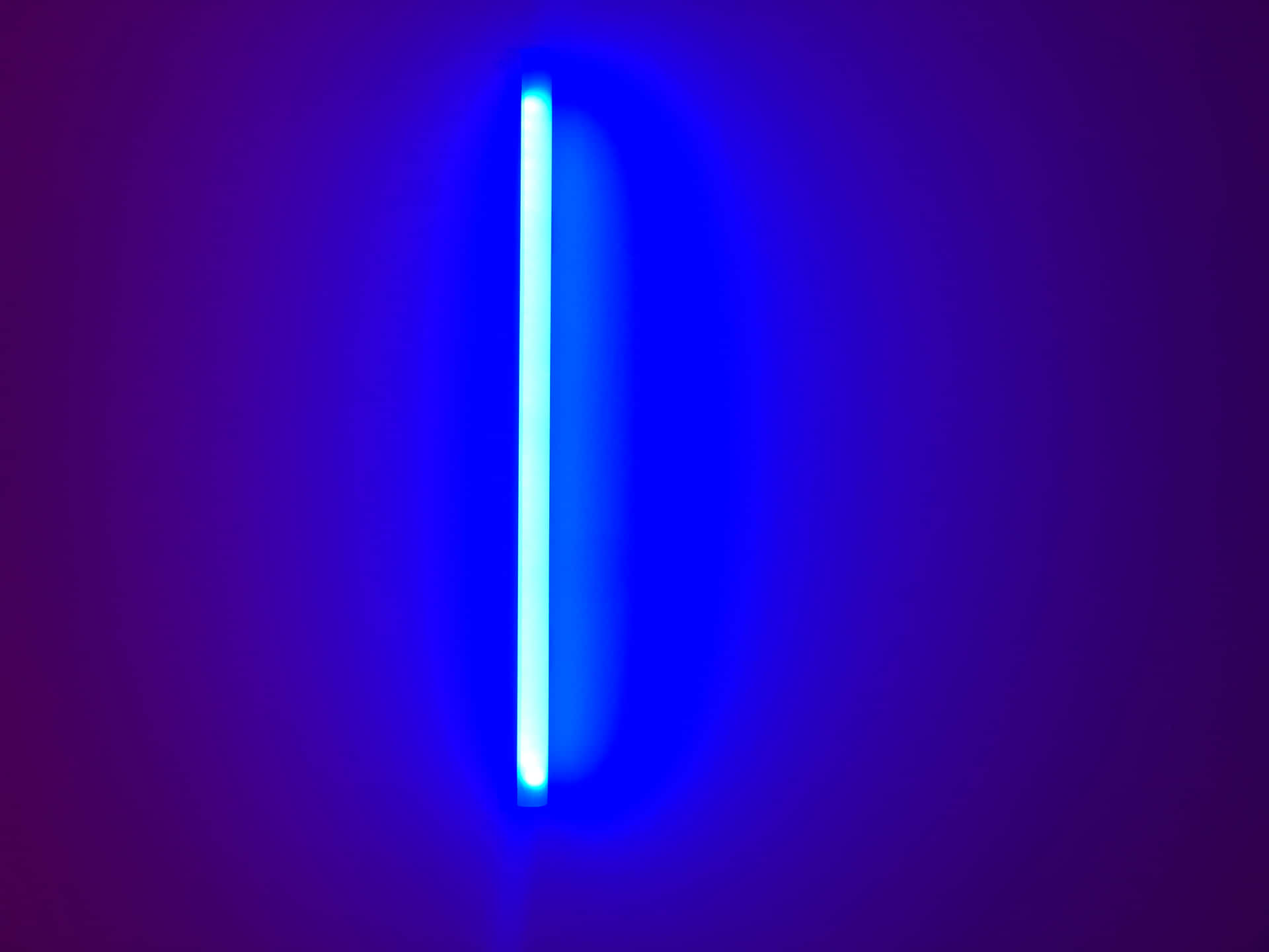 Abstract blue neon light wave