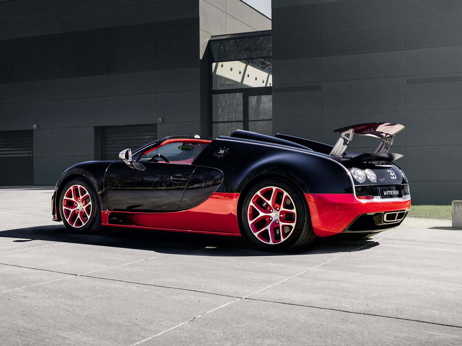 Bugatti Veyron - A Black And Red Sports Car Wallpaper