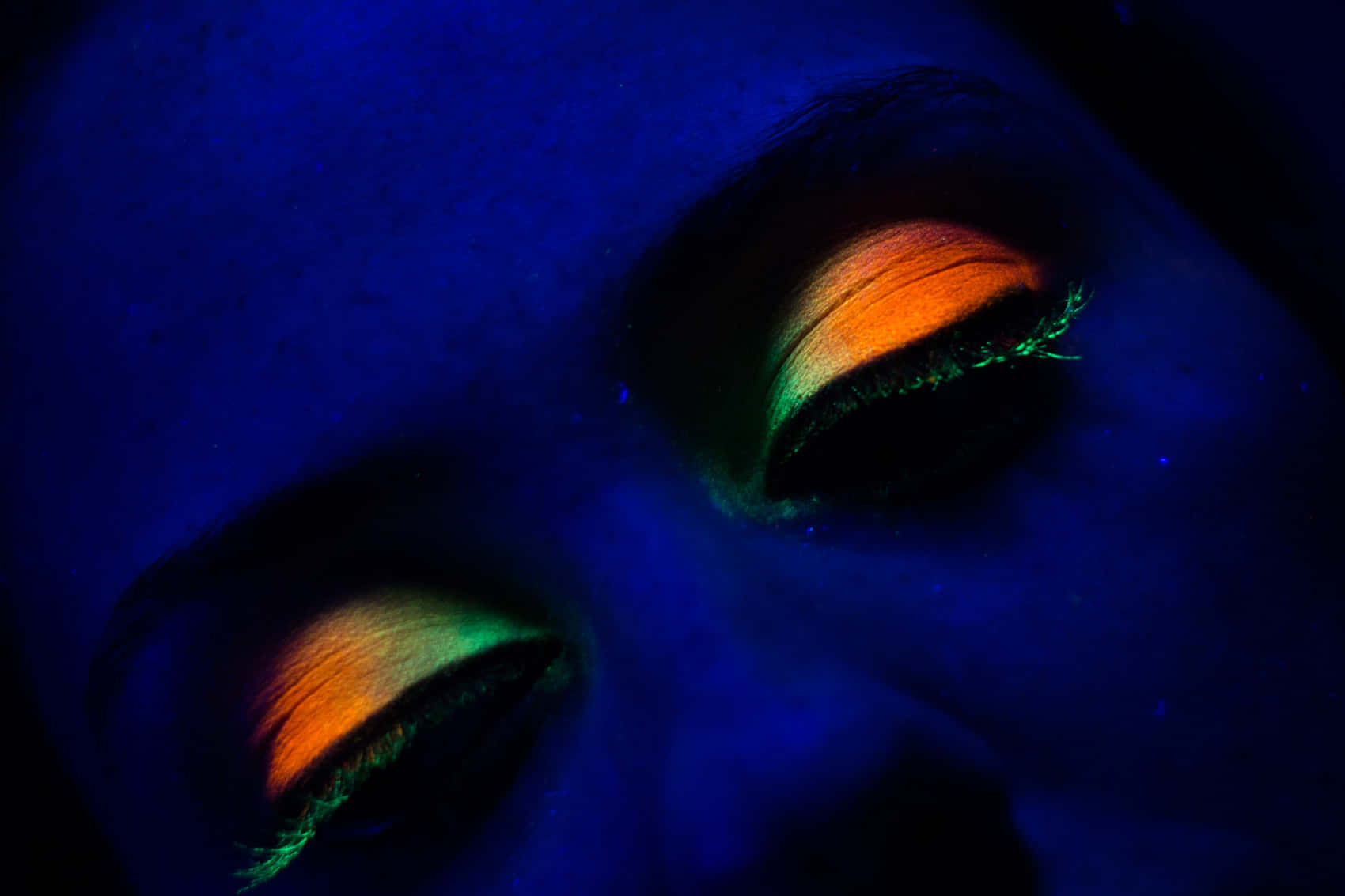 Neon Eyeshadow Under Black Light Wallpaper