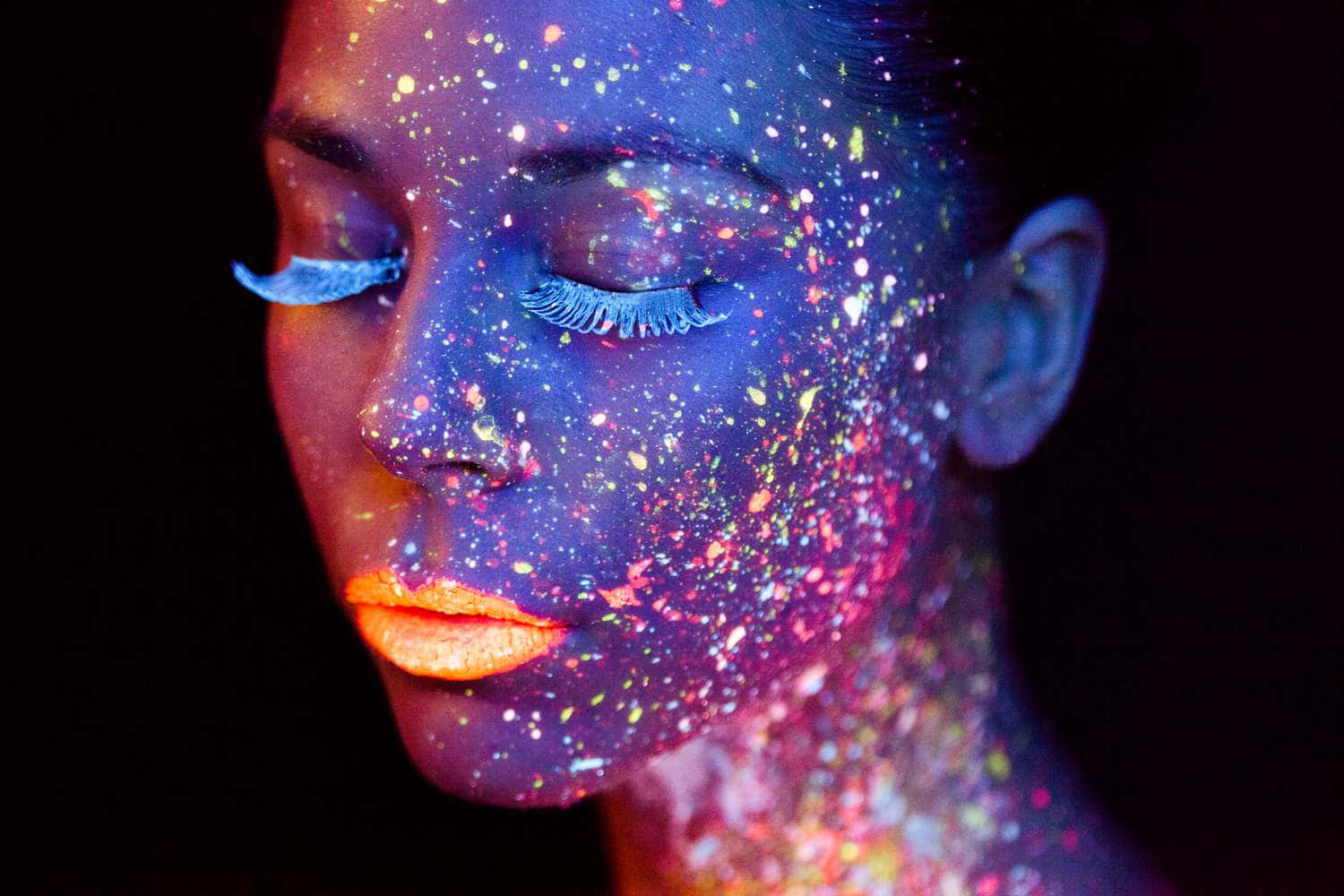 Neon_ Galaxy_ Makeup_ Under_ Black_ Light Wallpaper