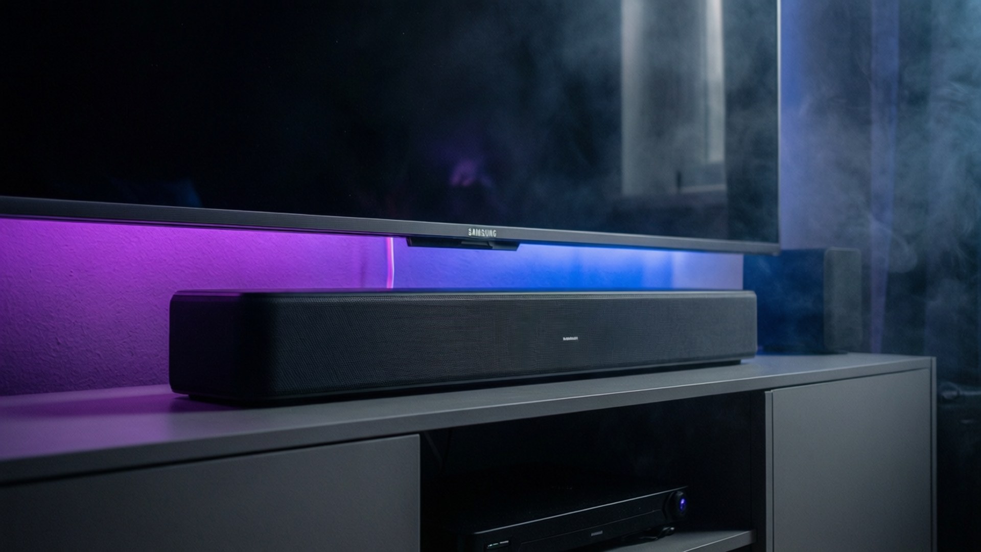 Samsung TV and soundbar with neon accents