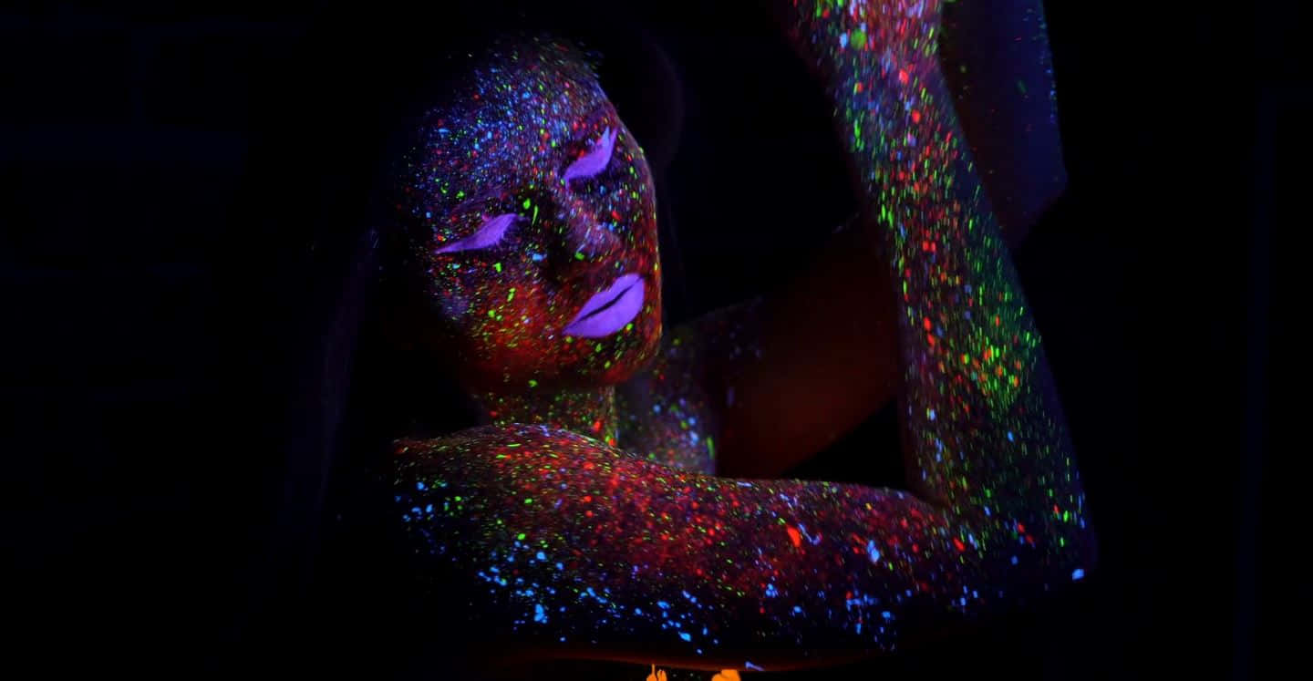 Neon Glitter Body Art Under Black Light Wallpaper