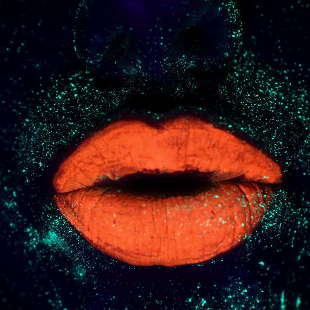 Neon_ Glow_ Lips_ Under_ Black_ Light Wallpaper