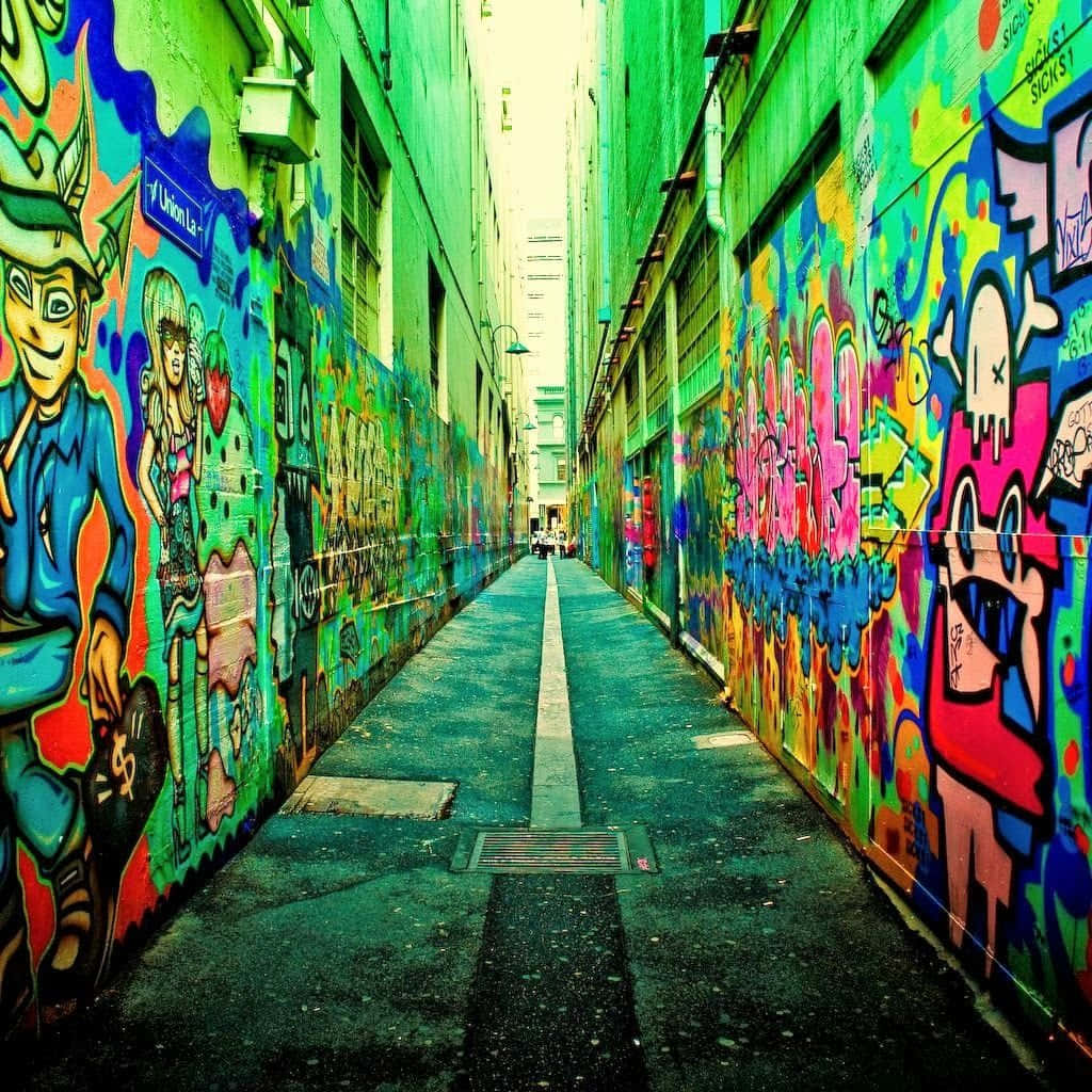 Neon Graffiti Art In Urban Setting Wallpaper