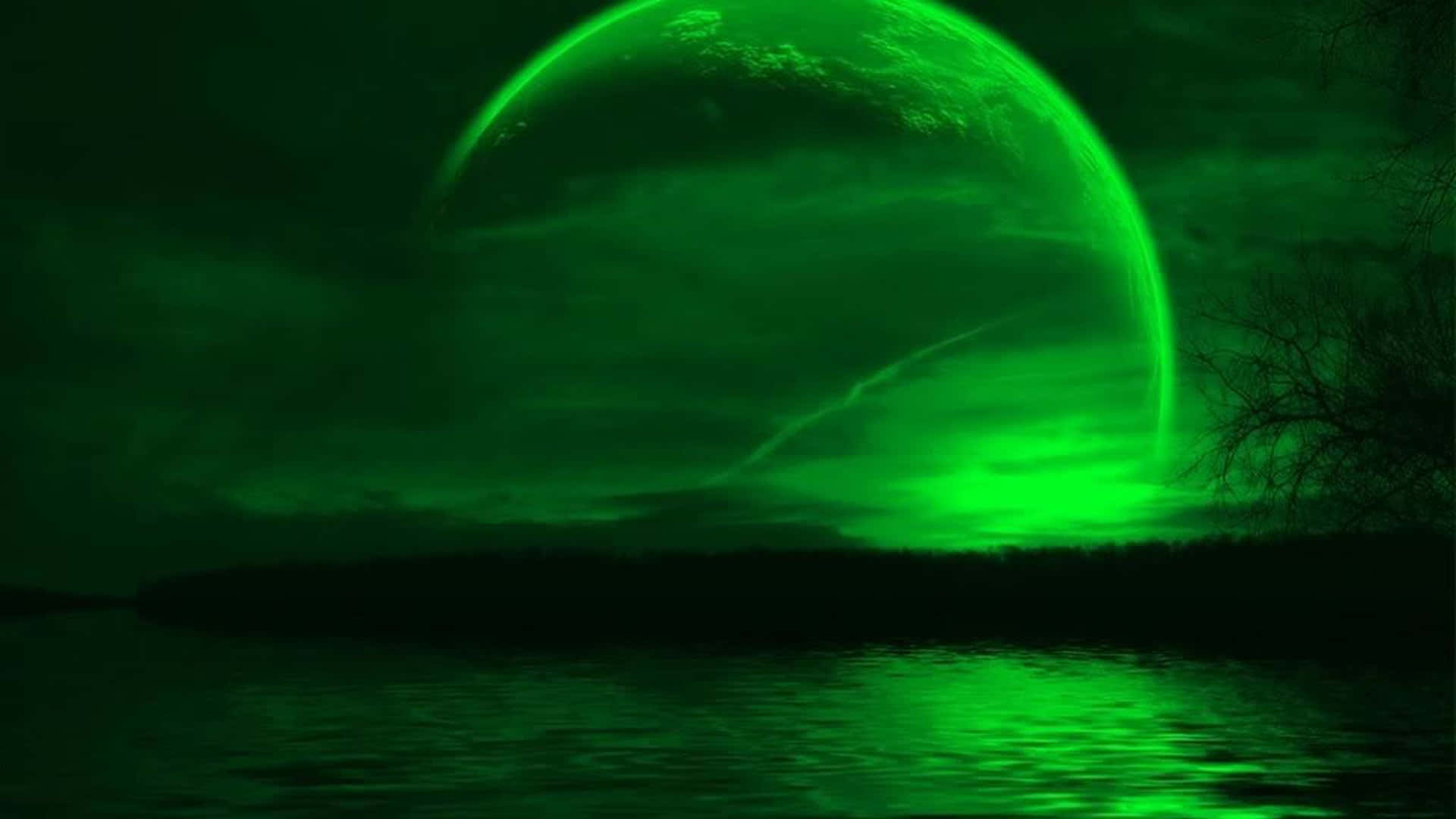 Unplaneta Verde En El Cielo Nocturno Fondo de pantalla