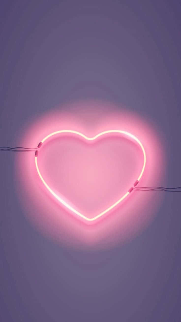 Lyse op dit liv med en elektrificerende Neon Heart! Wallpaper