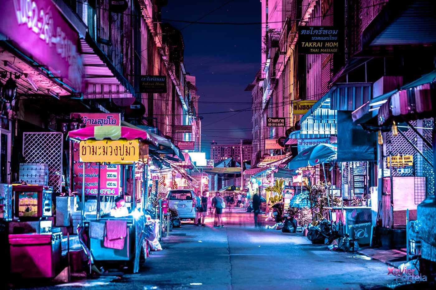 A laptop emitting neon lights for a unique tumblr experience. Wallpaper