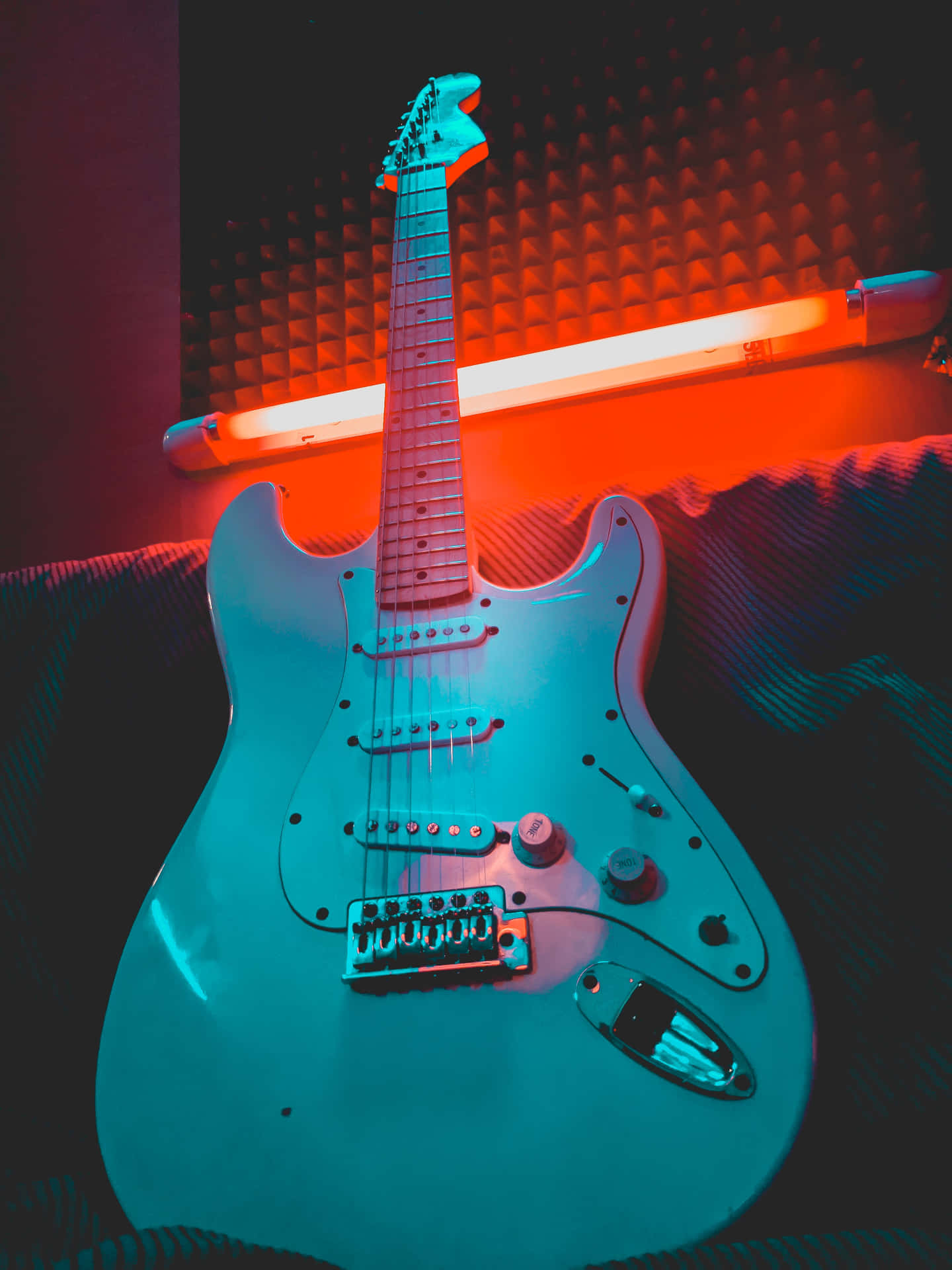 Neon Lit Electric Guitar Wallpaper