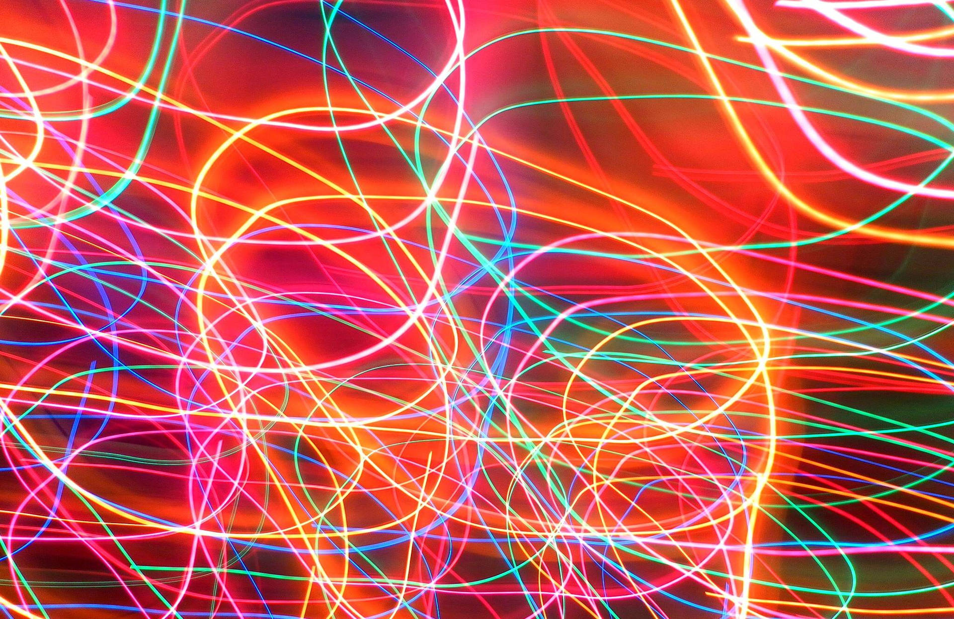Neon Nightscape: A Vibrant Spectrum In The Dark Wallpaper