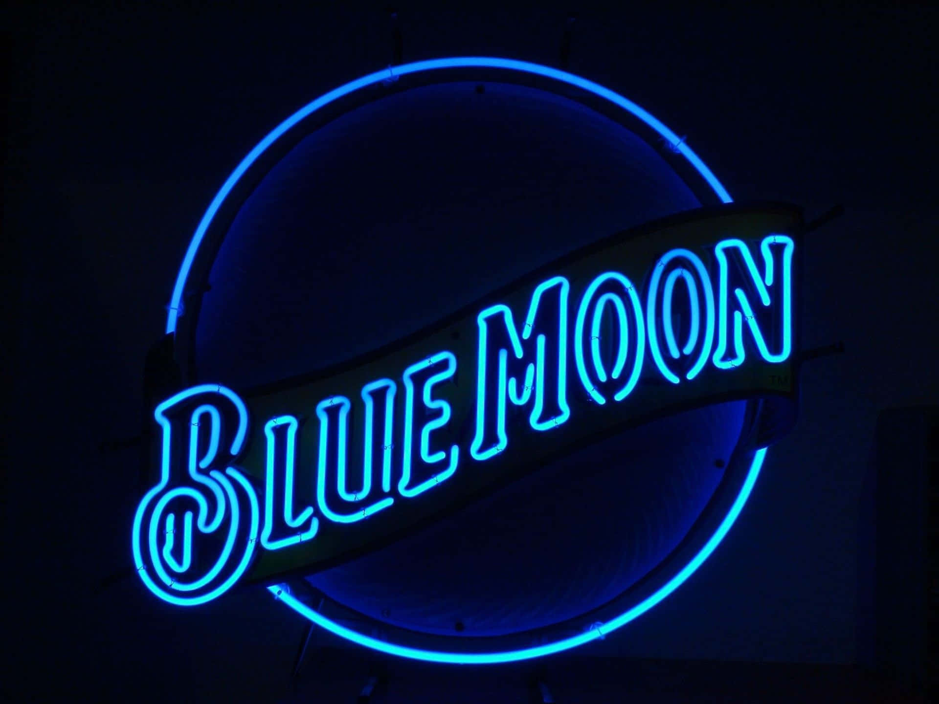 Immaginedi Una Luna Blu Con Scritte In Neon Led.